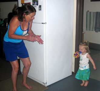 Playing 'where is baby'. They were hiding in the bathroom and running out in a peek-a-boo style game